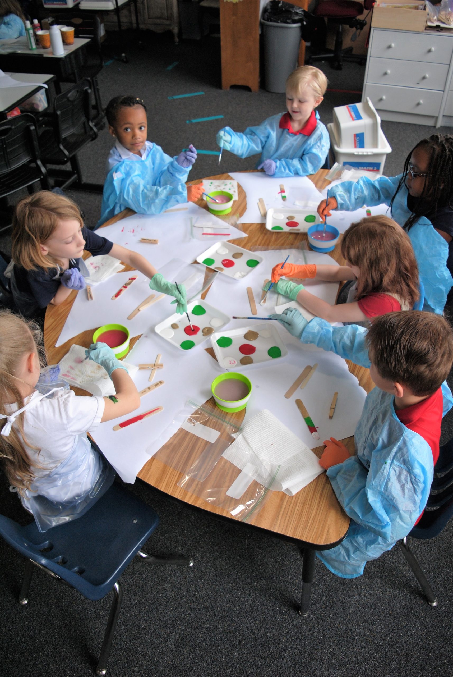 Children painting with watercolors