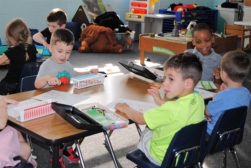 Preschoolers Working On Project